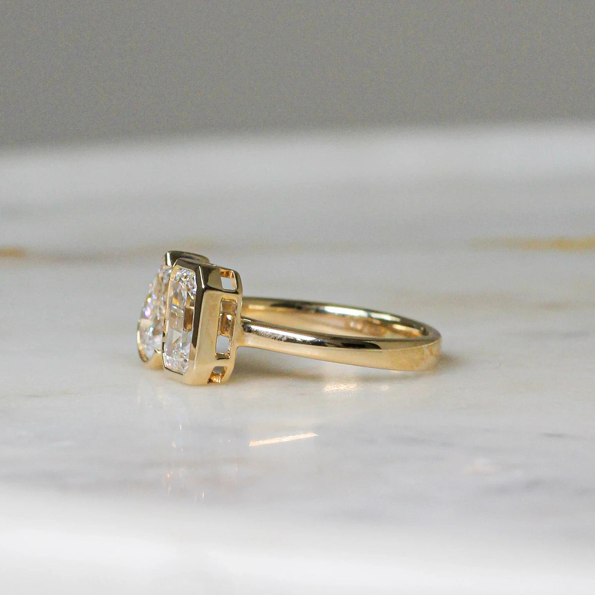 Emerald-Cut and Pear-Cut Diamond Full-Bezel Open T View 13