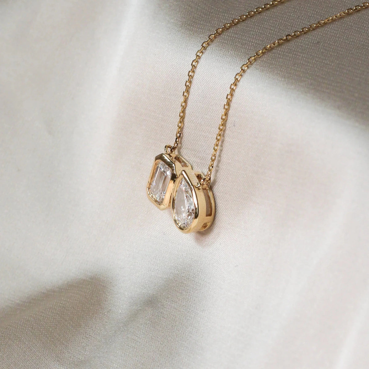 Modern Bezel-Set Emerald & Pear Diamond Toi et Moi View 5