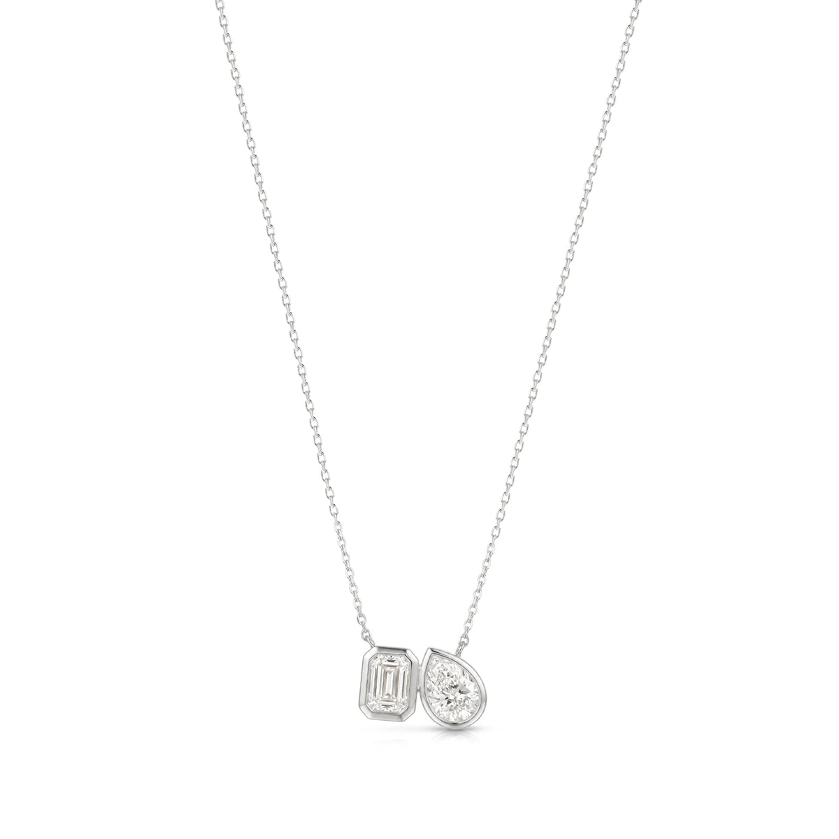Modern Bezel-Set Emerald & Pear Diamond Toi et Moi View 2