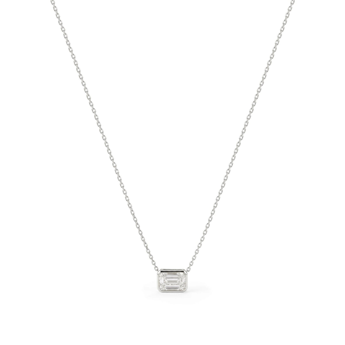 Emerald-Cut Diamond East-West Full-Bezel Solitaire View 2