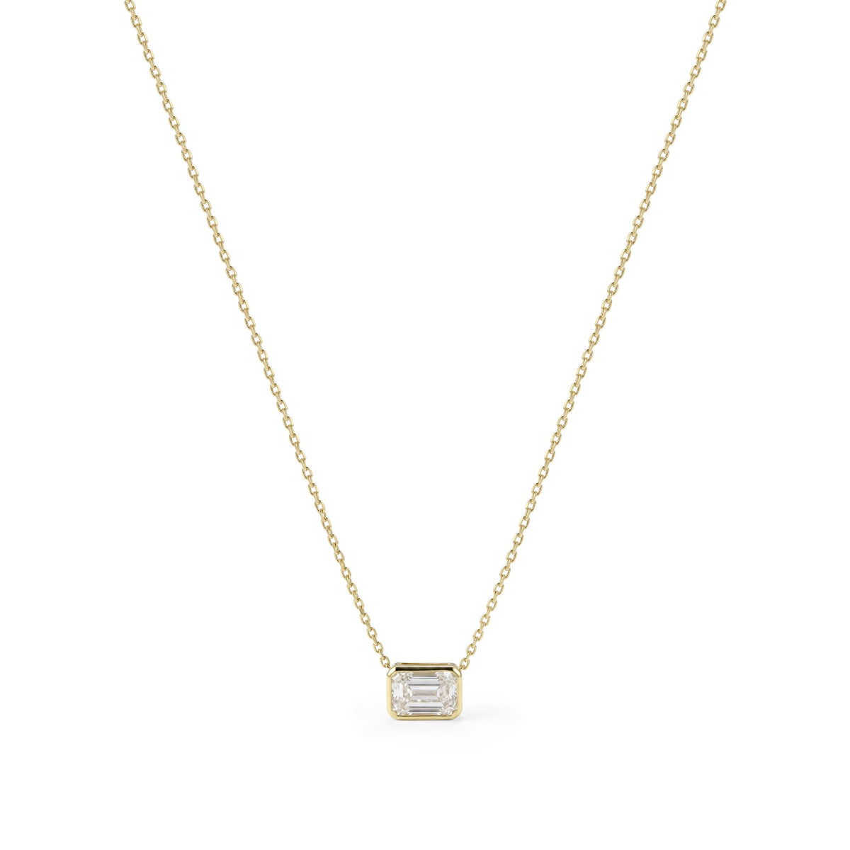 Emerald-Cut Diamond East-West Full-Bezel Solitaire View 3