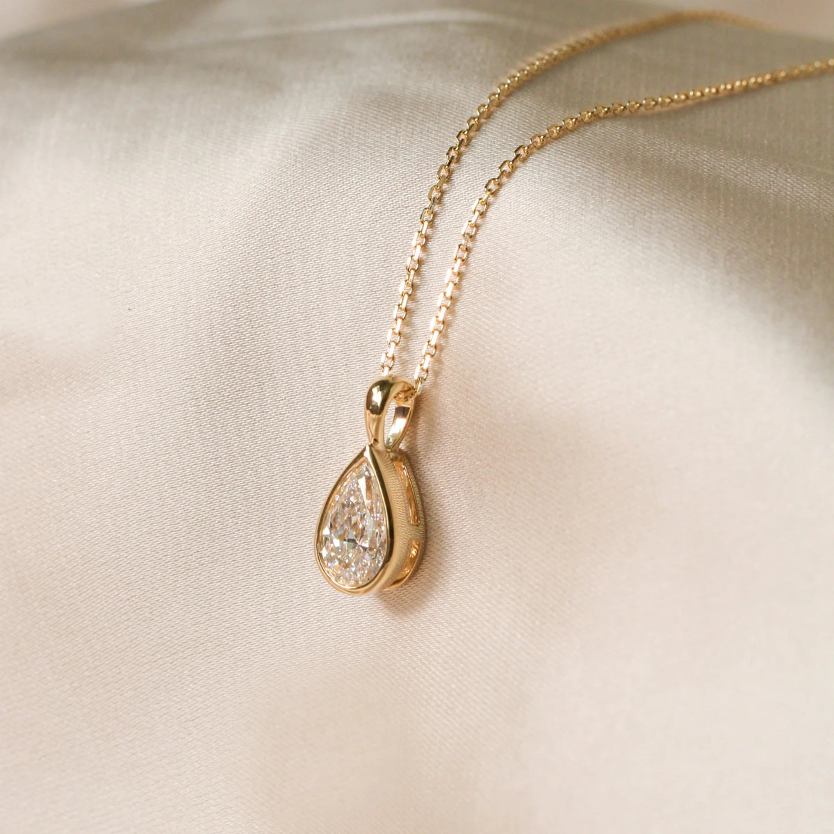 Modern Bezel Pear-Cut Diamond Necklace View 2