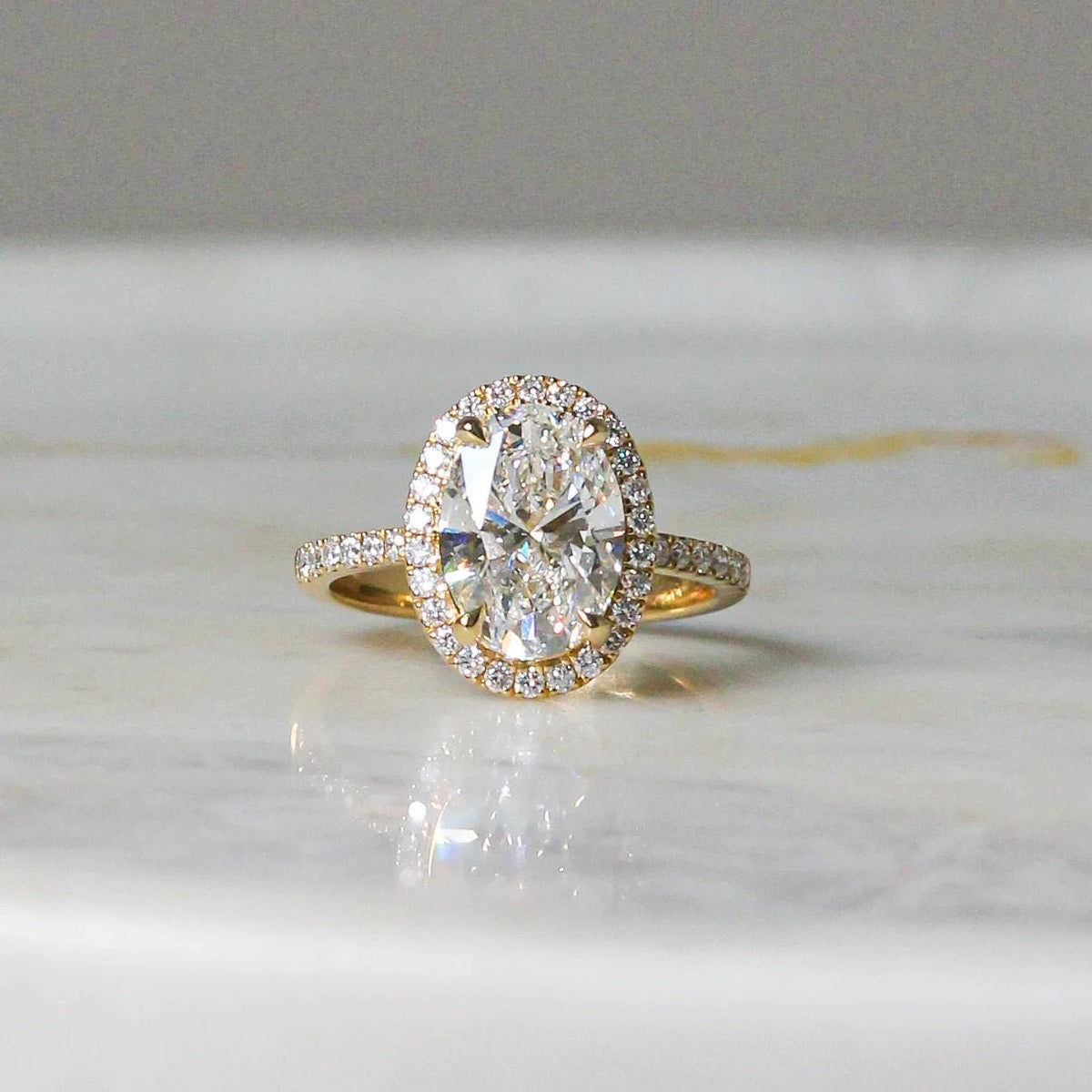 Classic Oval-Cut Diamond Halo Engagement / Stateme View 5