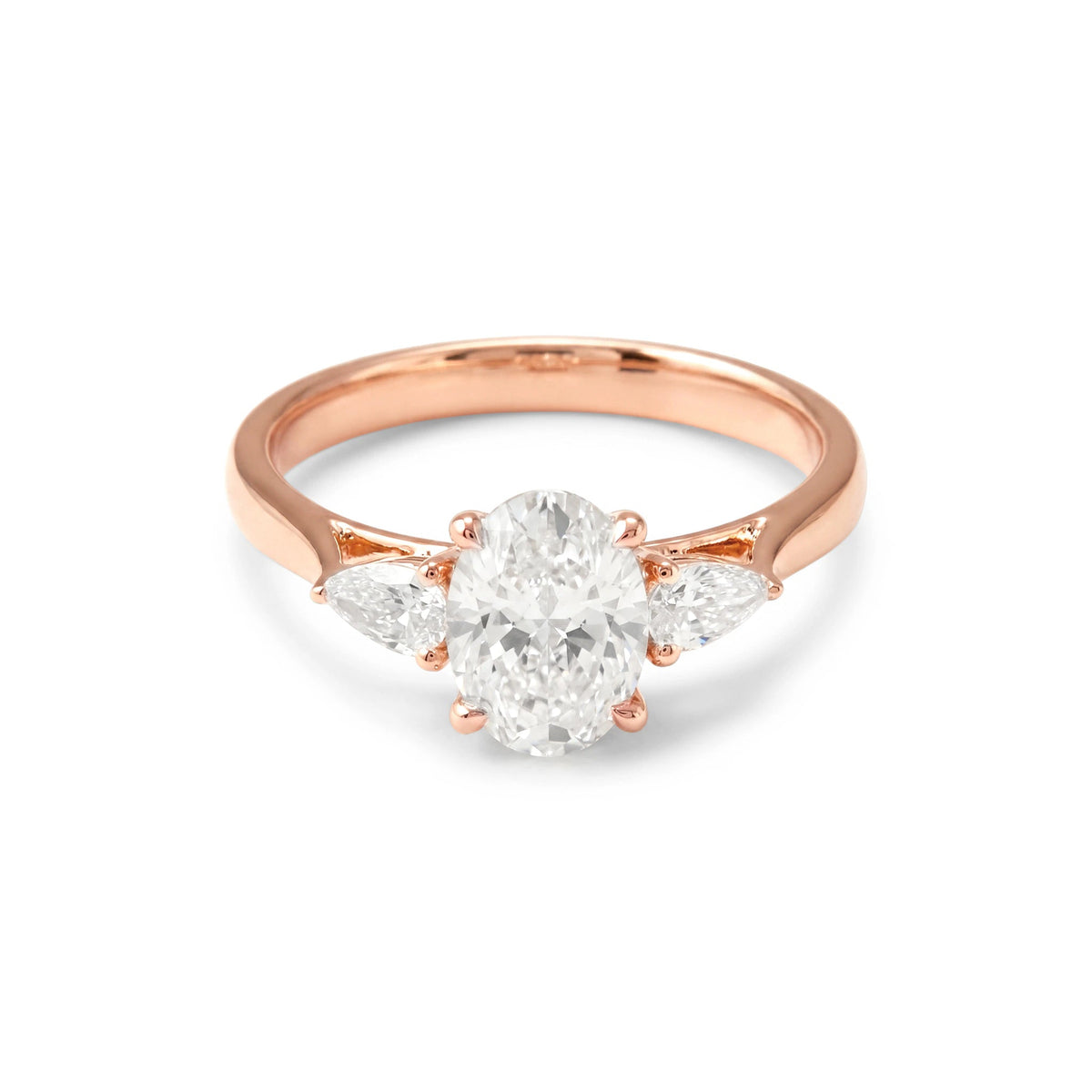 Oval Diamond Three-Stone Engagement Ring with Pear View 3