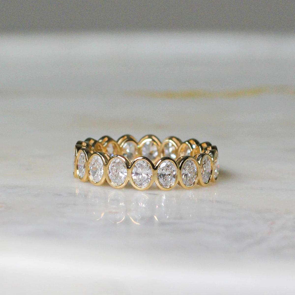 Modern Bezel Oval-Cut Diamond Eternity Ring View 8