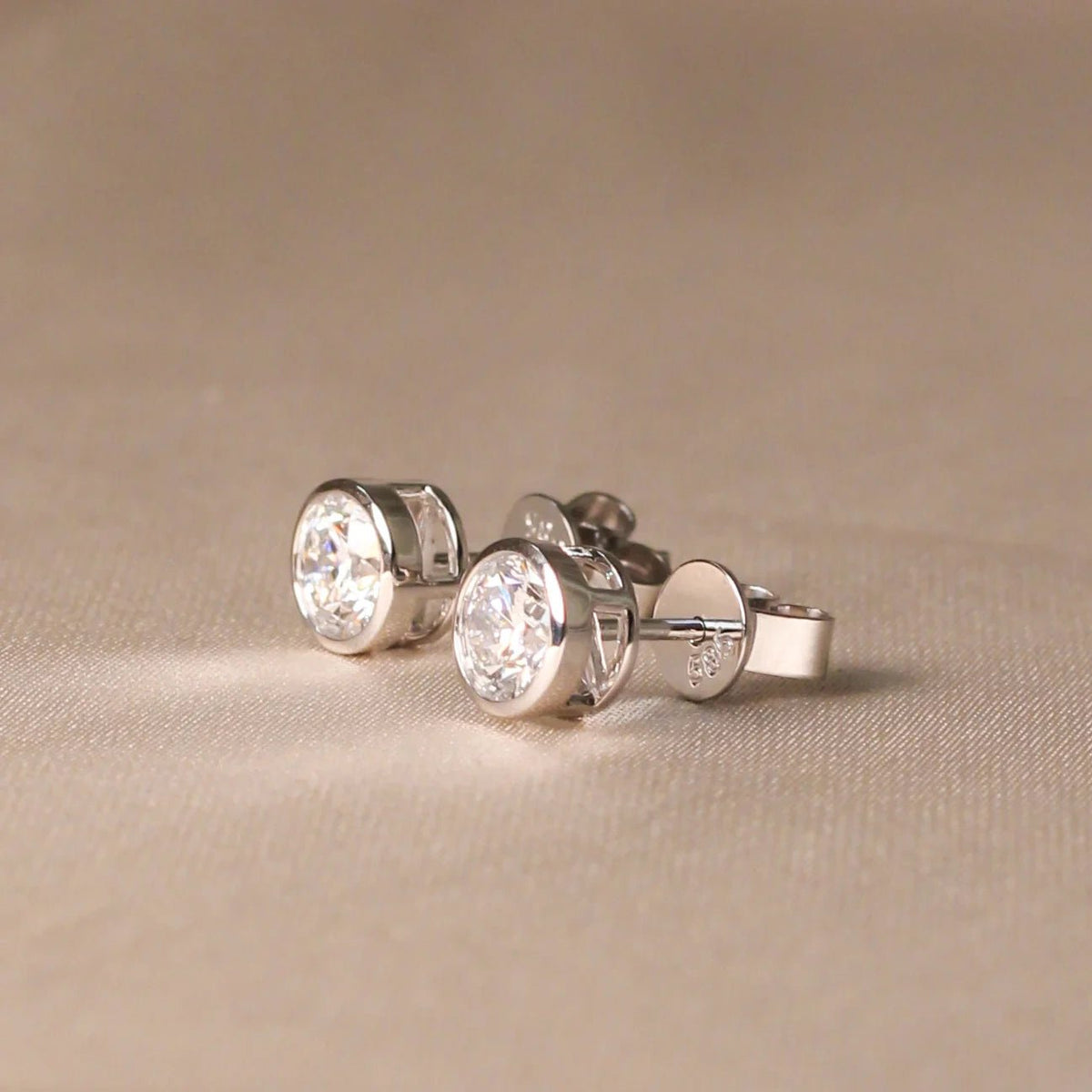 Round Brilliant Bezel-Set Diamond Stud Earrings View 2
