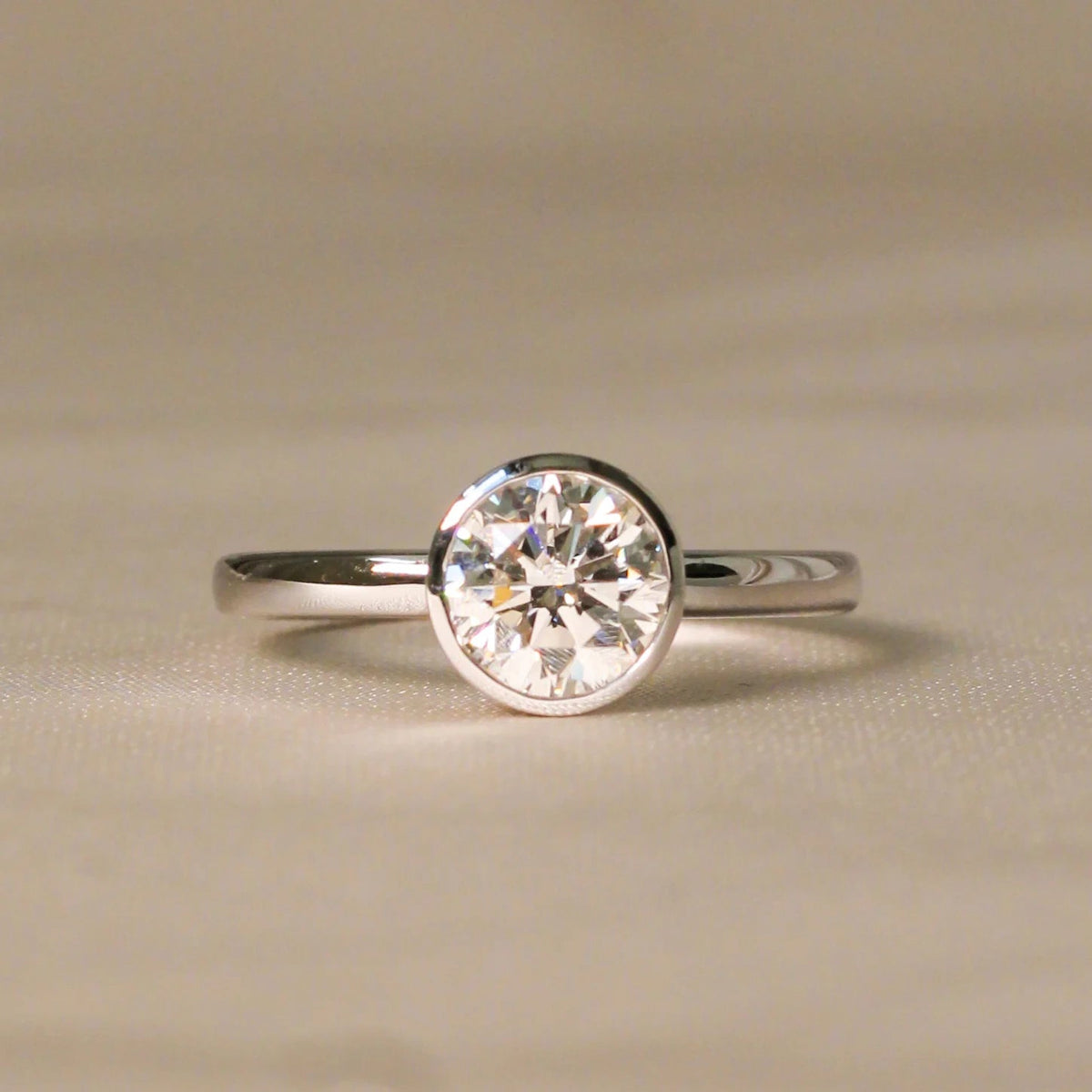 Round Brilliant Cut Diamond Full-Bezel Solitaire E ROSE 10K