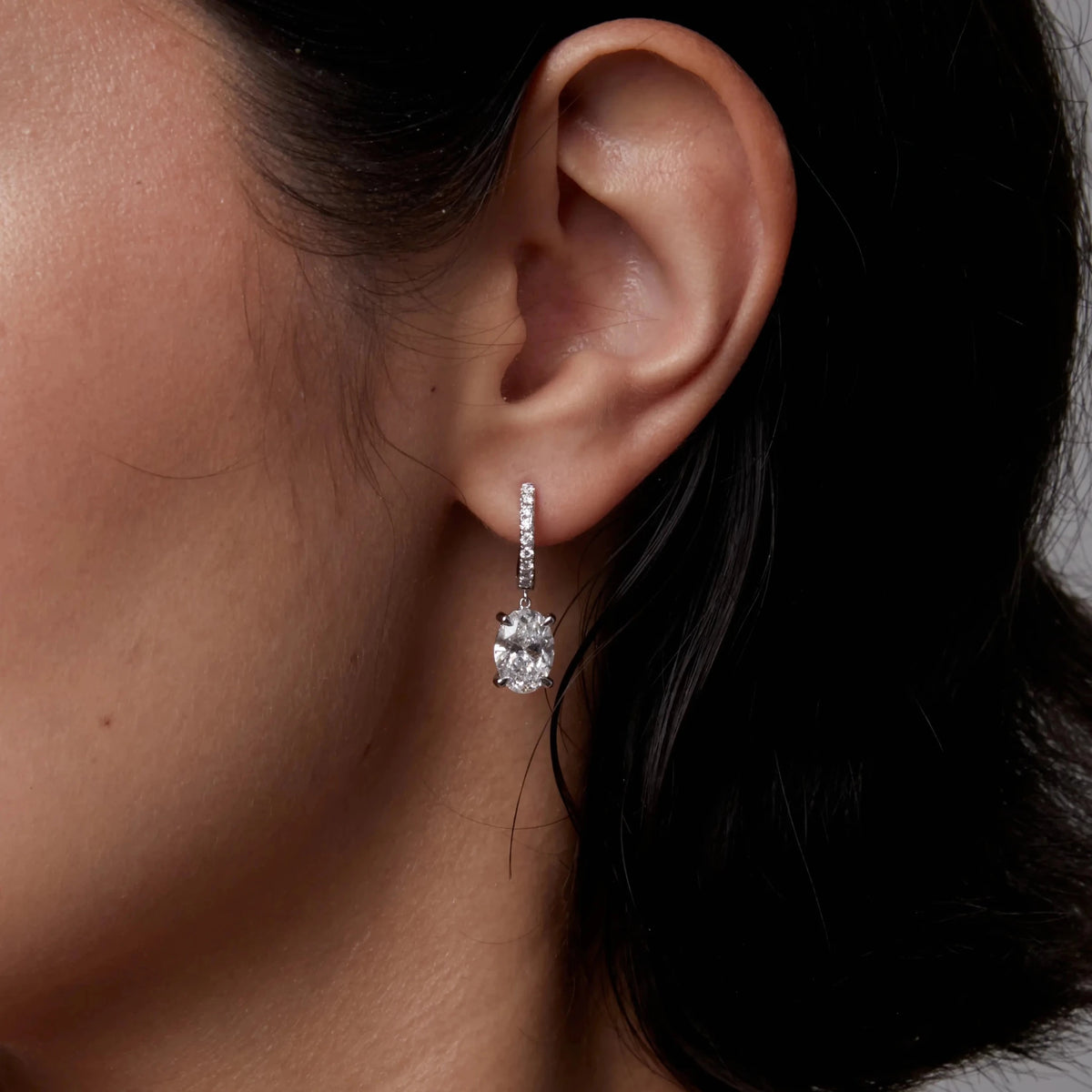 Oval Cut Solitaire Drop Earrings with Pavé Huggies View 4