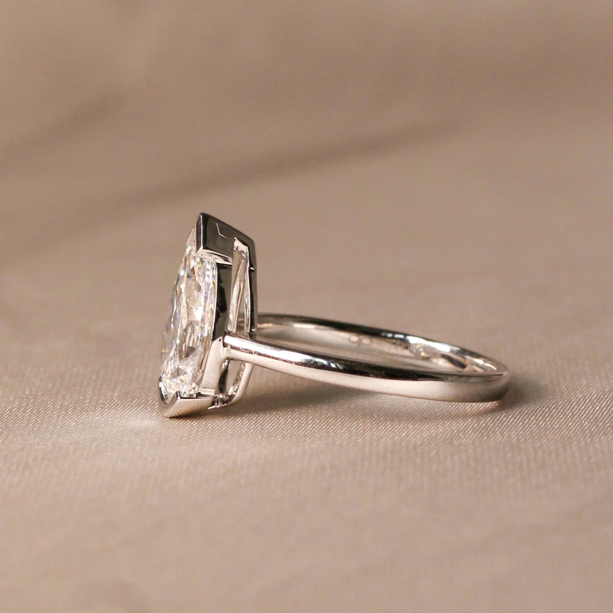 Modern V-Tip Pear Diamond Semi-Bezel Statement Rin View 3