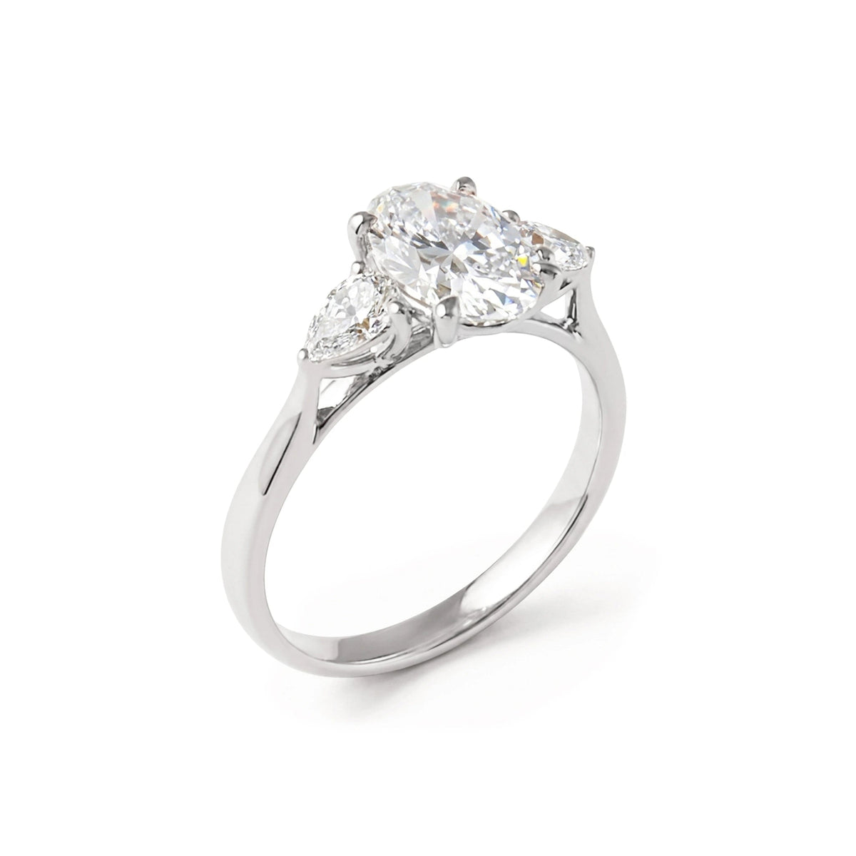 Oval Diamond Three-Stone Engagement Ring with Pear View 2
