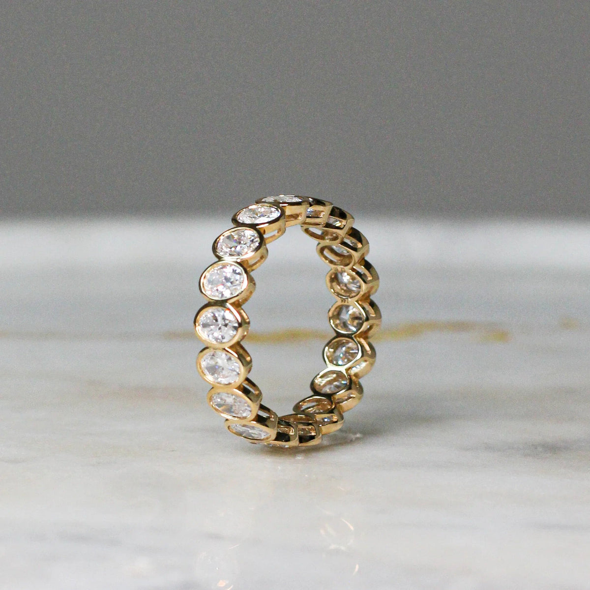 Modern Bezel Oval-Cut Diamond Eternity Ring View 9